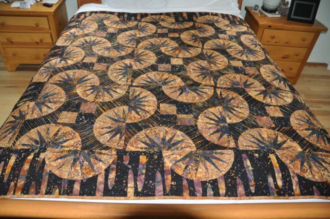 Drunkard's Wave quilt in fall colours, a little on the wild side.